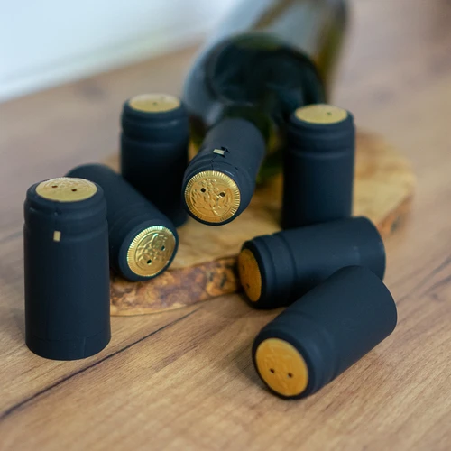 Capace cu perforație negre fi31mm 100buc. - 2