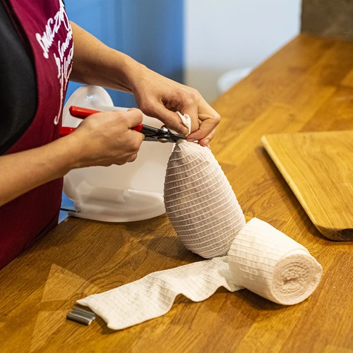 Plasă pentru mezeluri albă cu dimensiuni de 12,5 cm x 5 m, cu rezistență termică până la 220°C - 5